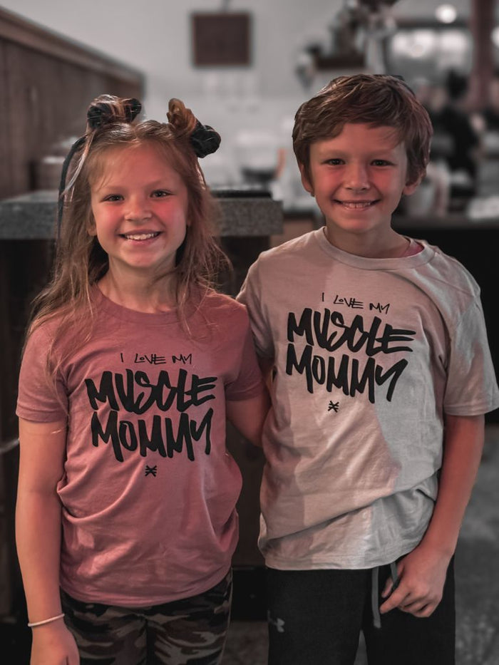 Twin kids wearing I love My Muscle Mommy t shirts from Pseudo Force