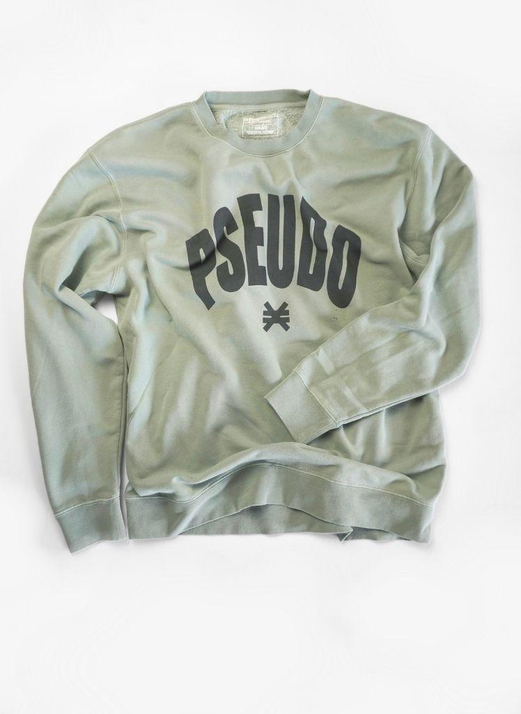 Sage green sweatshirt with 'PSEUBO' text on a white background